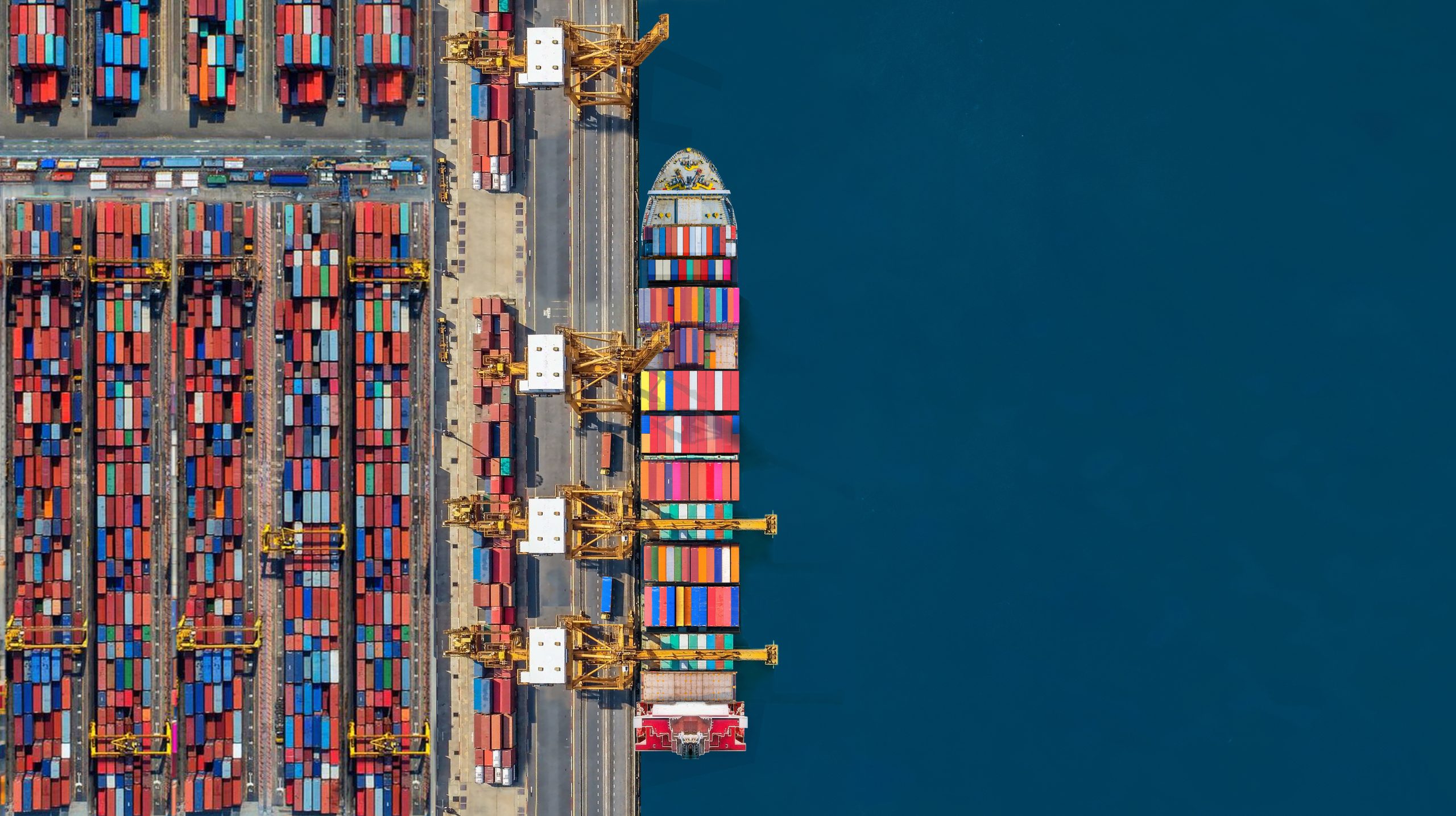 Cargo vessel alongside at an Omani port terminal