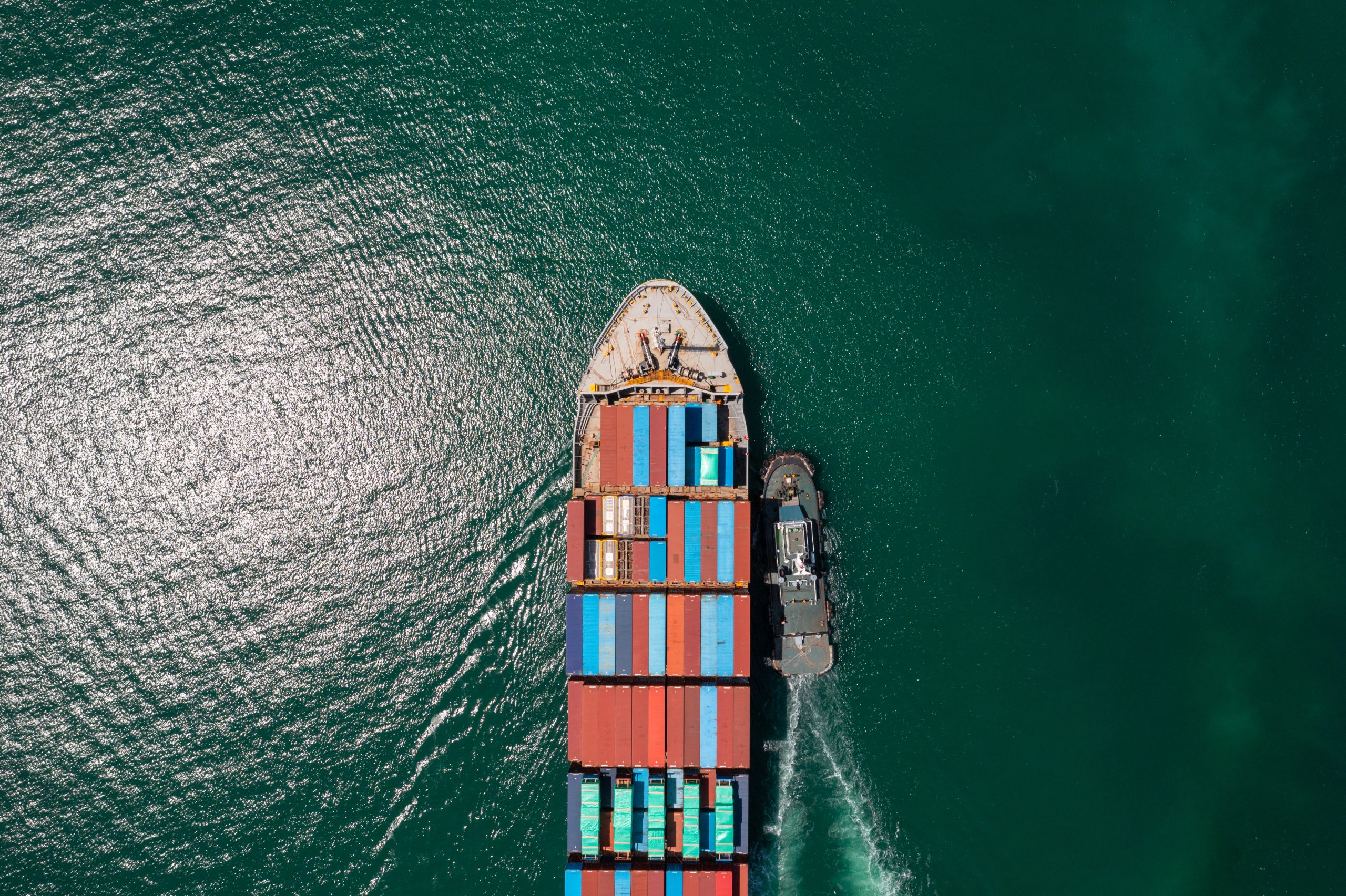 Port cranes handling containers during a vessel call